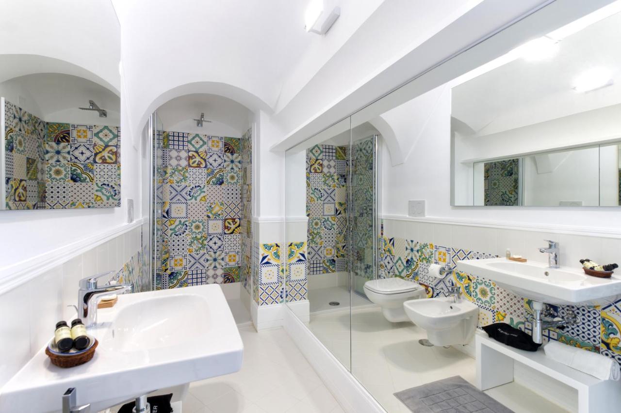 Amore Rentals - Palazzo Della Storia Amalfi Bagian luar foto