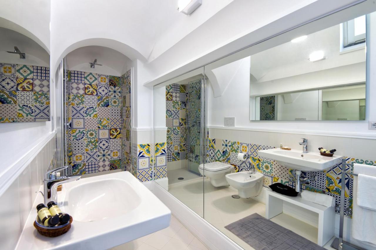 Amore Rentals - Palazzo Della Storia Amalfi Bagian luar foto