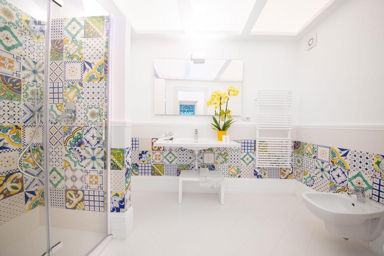 Amore Rentals - Palazzo Della Storia Amalfi Bagian luar foto