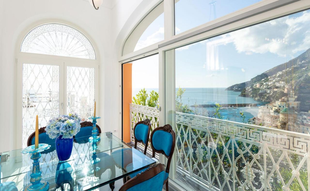 Amore Rentals - Palazzo Della Storia Amalfi Bagian luar foto