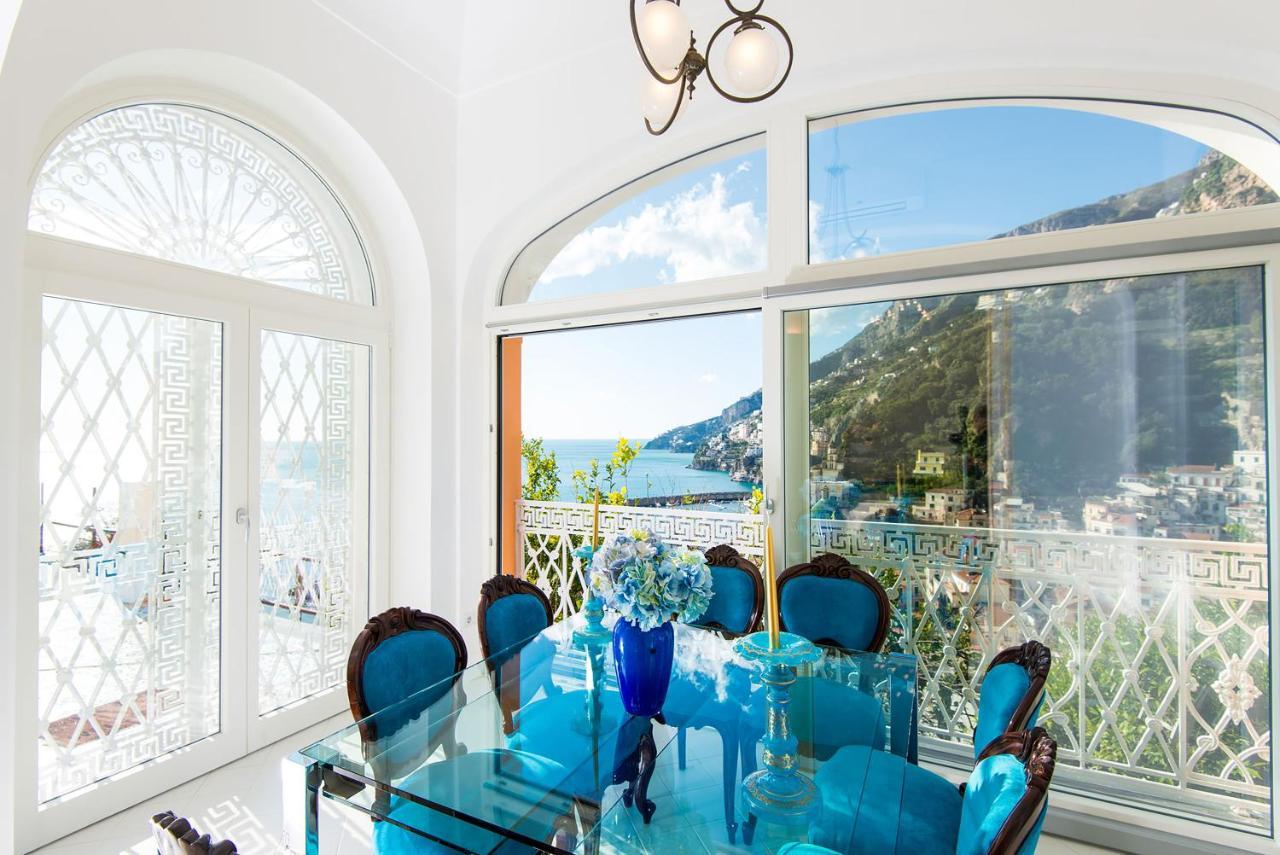 Amore Rentals - Palazzo Della Storia Amalfi Bagian luar foto
