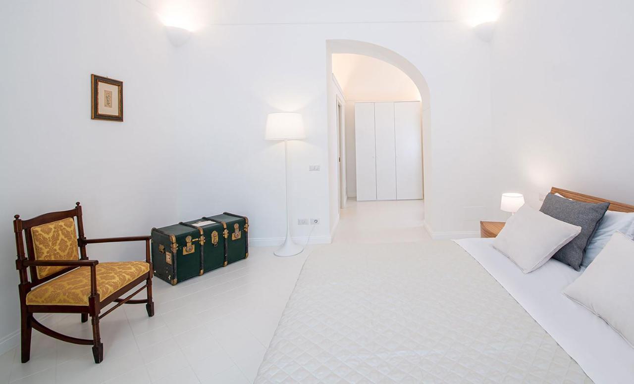 Amore Rentals - Palazzo Della Storia Amalfi Bagian luar foto